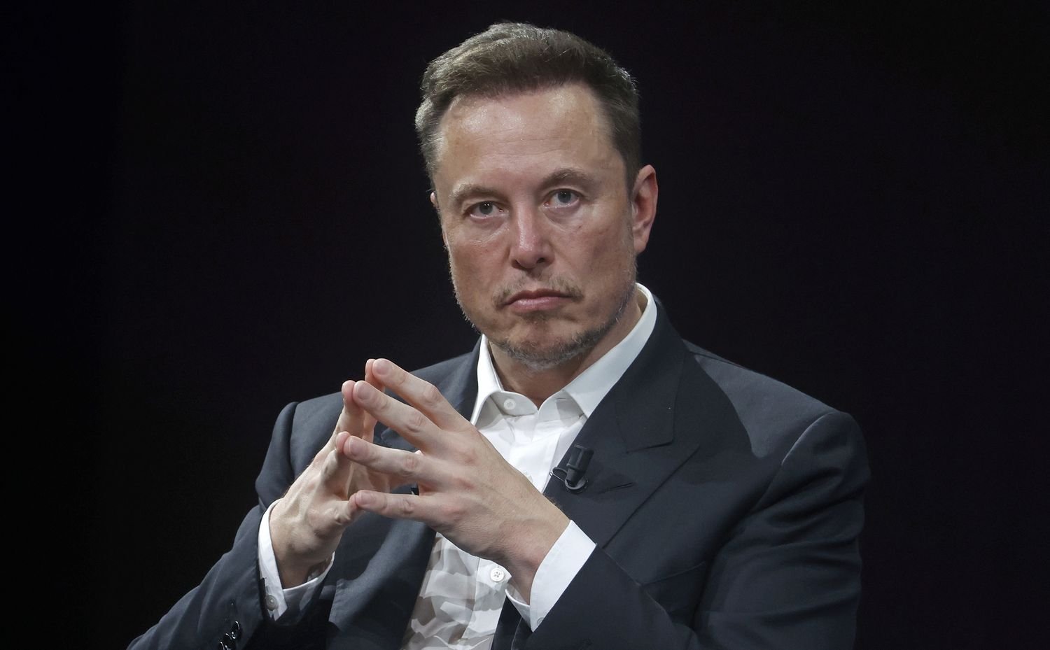 Elon Musk's Grok AI Goes Open Source Amid Ongoing OpenAI Legal Battle.